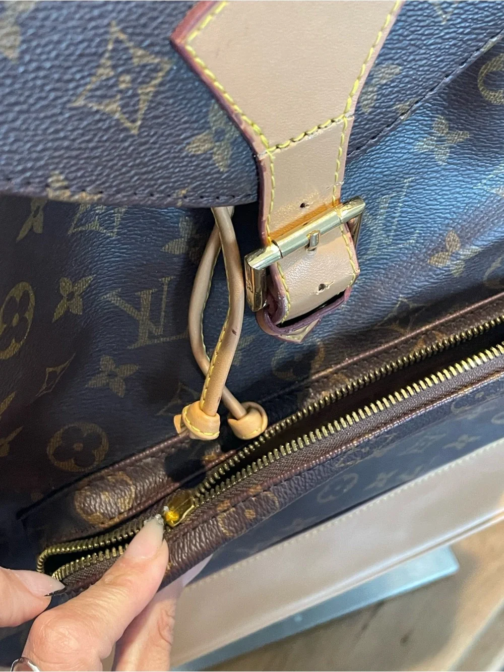 Brown Monogram Canvas Backpack broken from pocket zipper